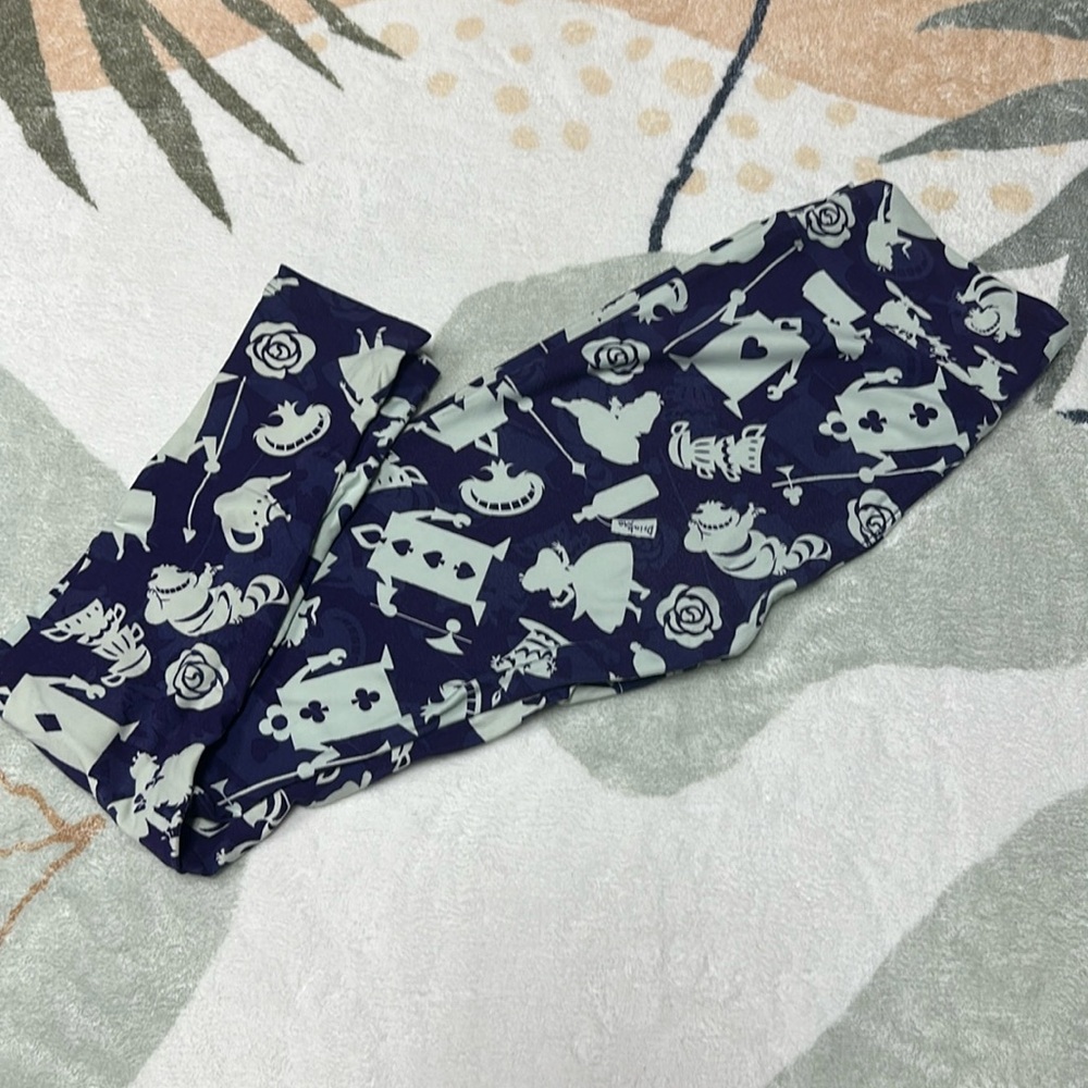 Lularoe purple Alice in wonderland leggings.